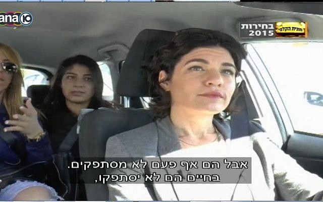 Meretz MK Tamar Zandberg debates passenger in her taxi, February 2015. (screen capture: Channel 10) Meretz MK Tamar Zandberg debates passenger in her taxi, February 2015. (screen capture: Channel 10)