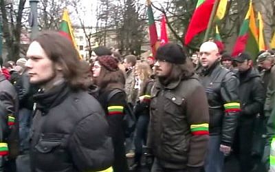 Lithuanian fascists marching through Kaunus, Lithuania in February 2014. (screen capture: YouTube)