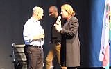 Jewish Home leader Naftali Bennett and Hatnua head Tzipi Livni, of the Zionist Camp, spar over giving up land for peace in this screen grab from a video uploaded February 1, 2015 . (Photo credit: screenshot/YouTube)