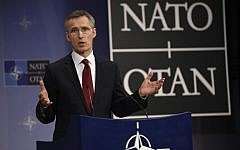 NATO Secretary General Jens Stoltenberg gives a press conference during a defense ministers meeting at NATO Headquarters in Brussels on February 5, 2015. (AFP Photo/John Thys)