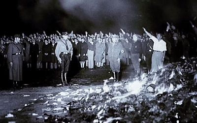 Nazi book-burning incident during the 1930s. (screen capture: YouTube/United States Holocaust Memorial Museum)