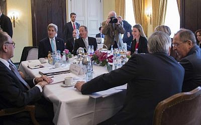 US Secretary of State John Kerry (second from the left) talks during a meeting with Russian Foreign Minister Sergey Lavrov (right) and other members of the the Quartet on the Middle East on the third day of the 51st Munich Security Conference (MSC) in Munich, southern Germany, on February 8, 2015. (photo credit: AFP/Pool/ Jim Watson)
