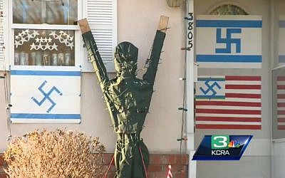 A house in Sacramento 'decorated' with swastikas (screen capture: KCRA)