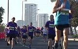 Runners in the 2015 Tel Aviv marathon, February 27, 2015 (screen capture: YouTube)