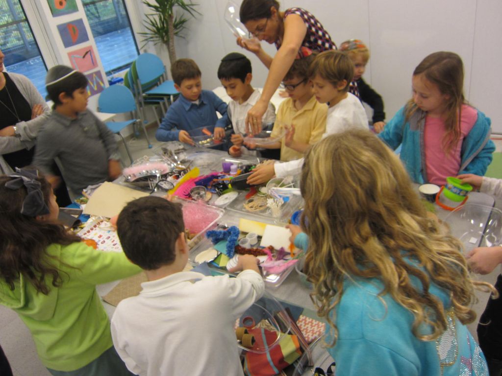 Shefa students working on an art project in which they make self-portrait collages. (The Shefa School) Shefa students working on an art project in which they make self-portrait collages. (The Shefa School)