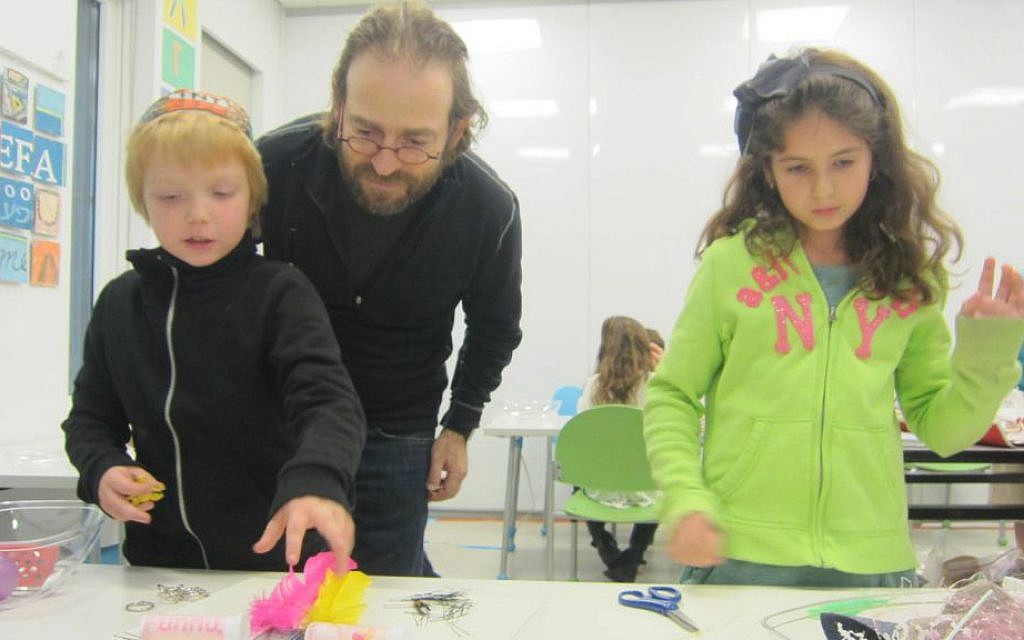 Shefa students making self-portrait collages. (The Shefa School)