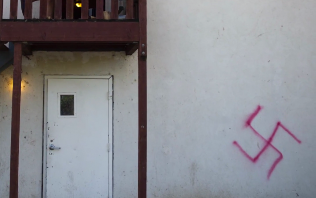 One of the two swastikas spray painted outside a Jewish fraternity at the University of California, Davis on January 31, 2015. One was spray painted on their back wall and the other on their steps. (Screen capture: Sacramento Bee) One of the two swastikas spray painted outside a Jewish fraternity at the University of California, Davis on January 31, 2015. One was spray painted on their back wall and the other on their steps. (Screen capture: Sacramento Bee)