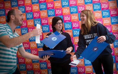 Posters reading "We are changing the rulers", referring to a change in government in the upcoming Israeli elections, seen at the campaign offices of the grassroots group V15 in Jerusalem on February 9, 2015. (photo credit: Miriam Alster/FLASH90)