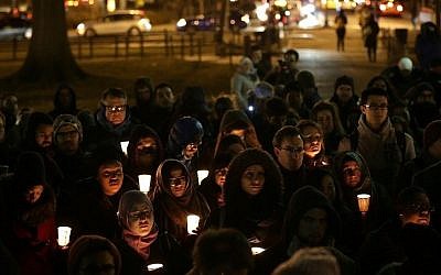 Supporters of the Council on American-Islamic Relations hold a vigil in Dupont Circle, Washington, DC, on February 12, 2015. (photo credit: AFP/Win McNamee/Getty Images)
