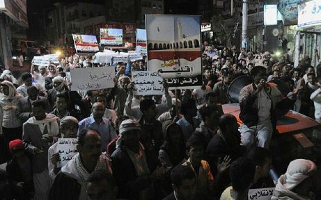 Yemeni people hold a rally to protest against Shiite rebels' announcement of taking over the country in Taiz, Yemen, Friday, Feb. 6, 2015 (photo credit: AP/Anees Mahyoub) Yemeni people hold a rally to protest against Shiite rebels' announcement of taking over the country in Taiz, Yemen, Friday, Feb. 6, 2015 (photo credit: AP/Anees Mahyoub)