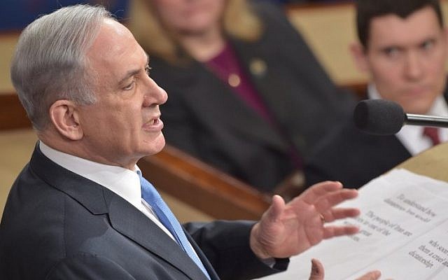 Prime Minister Benjamin Netanyahu addresses a joint meeting of the US Congress at the Capitol in Washington, DC, on March 3, 2015. (photo credit: Nicholas Kamm/AFP)
