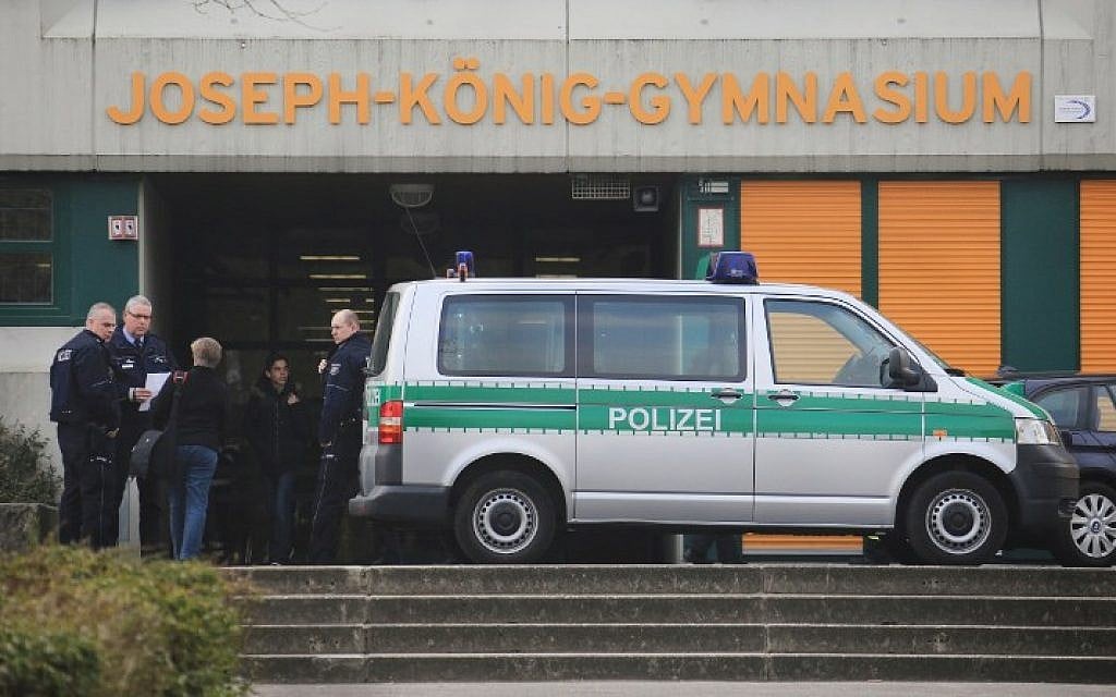 Police officers at the Joseph-Koenig secondary school in Haltern am See, western Germany on March 24, 2015. A group of 16 school children and 2 teachers from this school are believed to have been on board the crashed Germanwings airplane. (photo credit: Marcel Kusch/AFP/DPA)