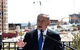 Prime Minister Benjamin Netanyahu gives a statement to the press during his visit in Har Homa, on March 16, 2015. (Menahem Kahana/AFP))