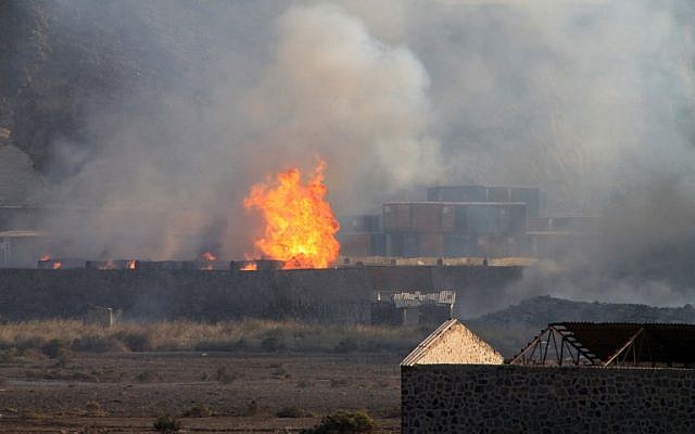 Flames and smoke billow from the site of an explosion that hit an arms depot in the Yemenite city of Aden on March 28, 2015. (AFP/SALEH AL-OBEIDI) Flames and smoke billow from the site of an explosion that hit an arms depot in the Yemenite city of Aden on March 28, 2015. (AFP/SALEH AL-OBEIDI)