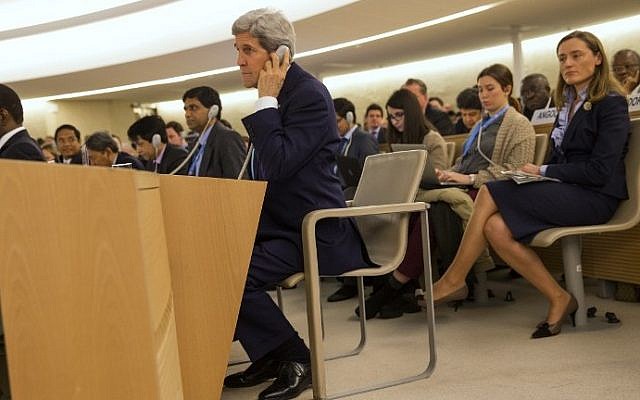 US Secretary of State John Kerry (foreground) listens to a speech on an earphone as he waits for his turn to deliver remarks to the United Nations Human Rights Council on March 2, 2015 (AFP PHOTO / POOL / EVAN VUCCI) US Secretary of State John Kerry (foreground) listens to a speech on an earphone as he waits for his turn to deliver remarks to the United Nations Human Rights Council on March 2, 2015 (AFP PHOTO / POOL / EVAN VUCCI)