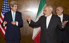 US Secretary of State John Kerry, left,  with Iranian Foreign Minister Mohammad Javad Zarif on March 2, 2015, in Montreux. (photo credit: AFP/POOL/EVAN VUCCI)