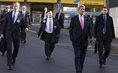 US Secretary of State John Kerry (second right) walks with members of his delegation ahead of a meeting with Iranian Foreign Minister Mohammad Javad Zarif for a new round of nuclear negotiations on March 3, 2015, in Montreux, Switzerland. (photo credit: Evan Vucc/AFP)