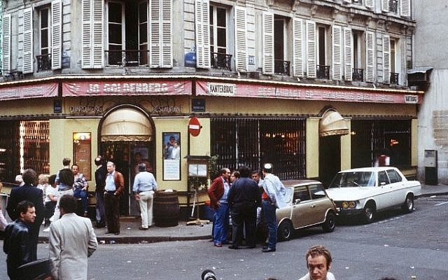 This file picture dated August 11, 1982, shows people standing in front of the Chez Jo Goldenberg restaurant in Paris, two days after it was devastated in an attack by Palestinian gunmen (AFP/ JOEL ROBINE) This file picture dated August 11, 1982, shows people standing in front of the Chez Jo Goldenberg restaurant in Paris, two days after it was devastated in an attack by Palestinian gunmen (AFP/ JOEL ROBINE)