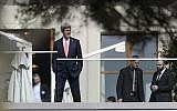 US Secretary of State John Kerry takes a break during Iran nuclear talks in Lausanne, Switzerland, on March 16, 2015. (photo credit: AFP/Fabrice Coffrini)