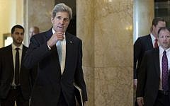 US Secretary of State John Kerry (L) on March 18, 2015 (AFP PHOTO / POOL / BRIAN SNYDER)
