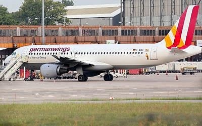 An Airbus 320 aircraft of Lufthansa's low-cost subsidiary Germanwings, at Berlin's Tegel airport August 29, 2014. (photo credit: AFP/DPA/STEPHANIE PILICK)