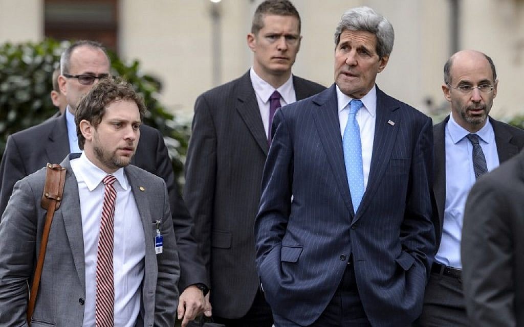 US Secretary of State John Kerry (2nd R) walks on March 29, 2015 with staff and security after a break in nuclear talks in Lausanne. Global powers are seeking to pin down the broad outlines of a deal to rein in Iran's suspect nuclear program by a March 31 deadline. (photo credit: AFP PHOTO / FABRICE COFFRINI)