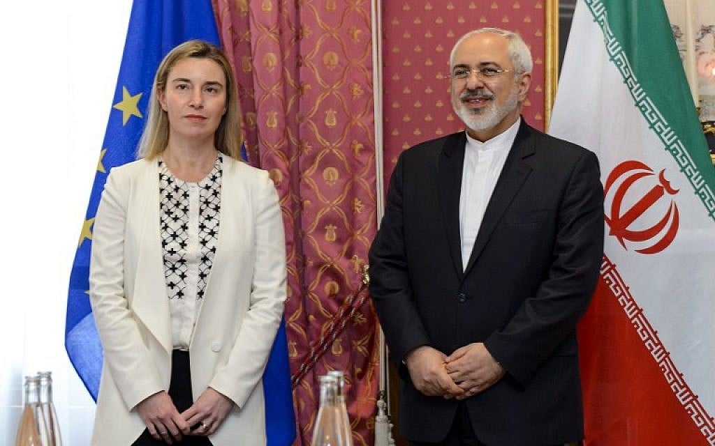 EU foreign policy chief Federica Mogherini (L) meets with Iranian Foreign Minister Mohammad Javad Zarif during Iranian nuclear talks in Lausanne on March 29, 2015. Global powers are seeking to pin down the broad outlines of a deal to rein in Iran's suspect nuclear program by a March 31 deadline. (photo credit: AFP PHOTO / FABRICE COFFRINI)