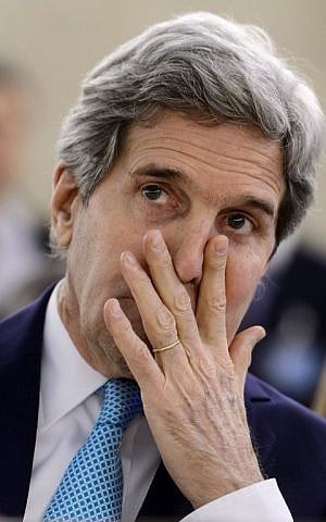 US Secretary of State John Kerry gestures prior to deliver his speech before delegates on March 2, 2015 at the opening day of UN human rights council session at the United Nations offices in Geneva. photo credit: Fabrice Coffrini/AFP)