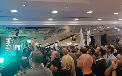 Crowds look on during a post-election speech by Naftali Bennett, March 17, 2015. (photo credit: Avi Lewis/Times of Israel, Jon Weidberg)
