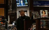 Prime Minister Benjamin Netanyahu seen on a television monitor in New York City as he delivers a speech to Congress on March 3, 2015. (photo credit: Spencer Platt/Getty Images/AFP)