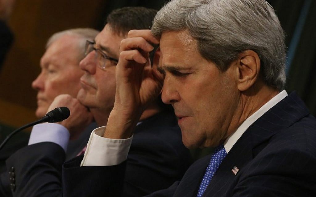Secretary of State John Kerry foreground, Defense Secretary Ashton Carter, center, and Chairman of the Joint Chiefs of Staff Gen. Martin Dempsey listen to questions during a Senate Foreign Relations Committee hearing on Capitol Hill, March 11, 2015 in Washington, DC. (photo credit: Mark Wilson/Getty Images/AFP) Secretary of State John Kerry foreground, Defense Secretary Ashton Carter, center, and Chairman of the Joint Chiefs of Staff Gen. Martin Dempsey listen to questions during a Senate Foreign Relations Committee hearing on Capitol Hill, March 11, 2015 in Washington, DC. (photo credit: Mark Wilson/Getty Images/AFP)