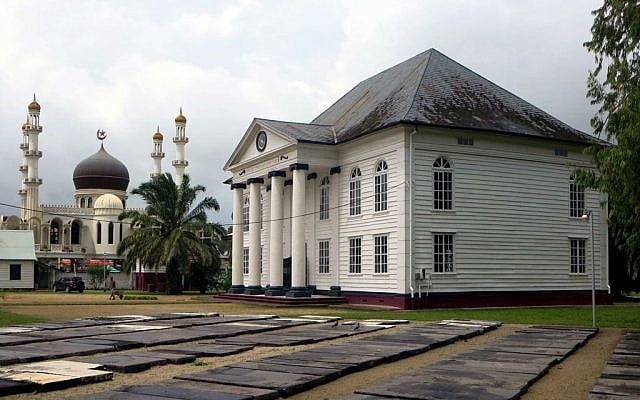 A synagogue and mosque in Paramaribo, Suriname. (photo credit: CC BY David Stanley, Flickr)