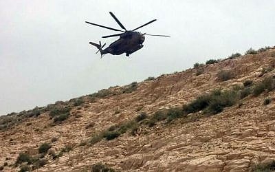 An IDF helicopter called out to assist in the recovery of a woman who fell to her death in Wadi Qelt, near Jerusalem, March 28. (MDA)