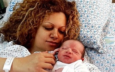 The widow of Jedan Assad gave birth to a baby boy on March 9, 2015. (photo credit: Courtesy)