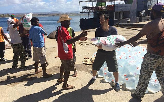 IsraAid volunteers helping locals on the cyclone-battered island-nation of Vanuatu, March 2011 (photo credit: courtesy)