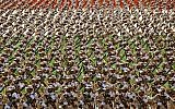 Members of Iran's Revolutionary Guard Corps are seen at an annual military parade in front of the mausoleum of the late Ayatollah Khomeini just outside Tehran on September 22, 2014. (AP/Ebrahim Noroozi/File)