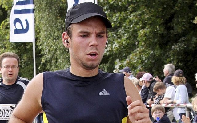 In this Sunday, Sept. 13, 2009 photo, Andreas Lubitz competes at the Airportrun in Hamburg, northern Germany. Germanwings co-pilot Lubitz appears to have hidden evidence of an illness from his employers, including having been excused by a doctor from work the day he crashed a passenger plane into a mountain, prosecutors said. (photo credit: AP Photo/Michael Mueller) In this Sunday, Sept. 13, 2009 photo, Andreas Lubitz competes at the Airportrun in Hamburg, northern Germany. Germanwings co-pilot Lubitz appears to have hidden evidence of an illness from his employers, including having been excused by a doctor from work the day he crashed a passenger plane into a mountain, prosecutors said. (photo credit: AP Photo/Michael Mueller)