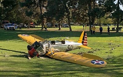 Harrison Ford's plane lies where it crash-landed on Penmar Golf Course in the Venice area of Los Angeles on Thursday, March 5, 2015. (photo credit: AP Photo/Damian Dovarganes)