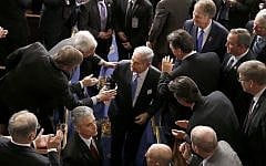 Prime Minister Benjamin Netanyahu shakes hands as he leaves the House chamber on Capitol Hill in Washington, Tuesday, March 3, 2015, after addressing a joint meeting of Congress in a speech opposing the imminent Iran nuclear deal. (AP/Andrew Harnik)