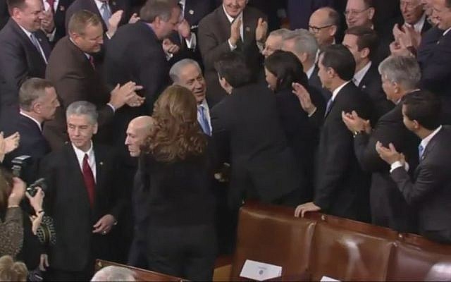 American lawmakers greet Prime Minister Benjamin Netanyahu as he enters the House of Representatives to deliver a speech, Tuesday, March, 3, 2015 (screen capture: YouTube) American lawmakers greet Prime Minister Benjamin Netanyahu as he enters the House of Representatives to deliver a speech, Tuesday, March, 3, 2015 (screen capture: YouTube)
