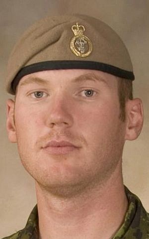 This Sept. 16, 2009 photo shows Sgt. Andrew Joseph Doiron, a member of the Canadian Special Operations Regiment. Doiron was killed in a friendly fire incident in northern Iraq on Saturday, March 7, 2015. (Photo credit: AP/Canadian Armed Forces via The Canadian Press)