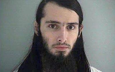 This Wednesday Jan. 14, 2015 file photo made available by the Butler County Jail shows Christopher Lee Cornell.  (photo credit: AP/Butler County Jail)