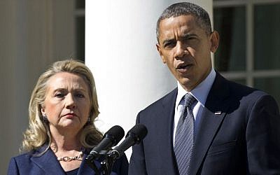 Then-US president Barack Obama (right), accompanied by then-secretary of state Hillary Clinton, speaks in the Rose Garden of the White House in Washington, DC, September 12, 2012. (AP/Manuel Balce Ceneta, File)