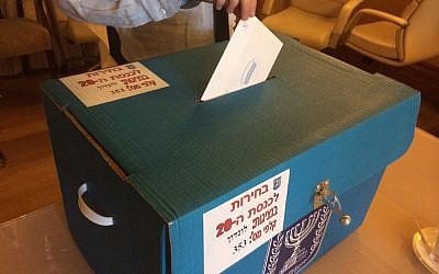 Voting at the Israeli embassy in London, March 5, 2015 (photo credit: Arieh Miller)