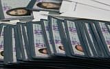 A stack of Israeli identification cards, January 22, 2008. (photo credit: Anna Kaplan/ Flash90)