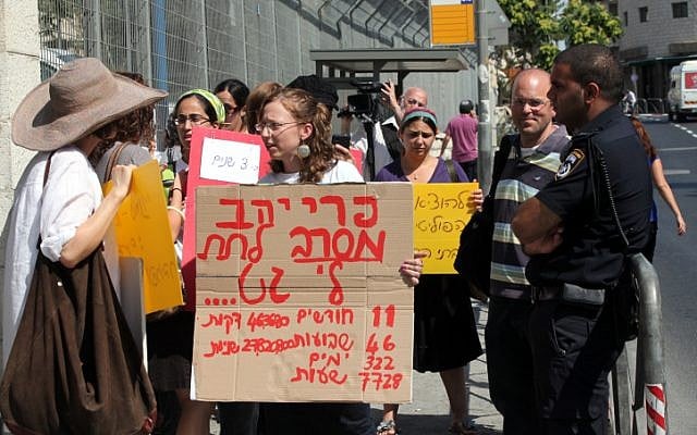 Illustrative: Demonstrators from the Agunot organization protest outside the Justice Ministry in Jerusalem in 2011. (Yossi Zamir/Flash90) Illustrative: Demonstrators from the Agunot organization protest outside the Justice Ministry in Jerusalem in 2011. (Yossi Zamir/Flash90)