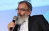 Rabbi David Stav, co-founder and chairman of the Tzohar rabbinical organization, speaks at the 5th annual Israeli Presidential Conference in Jerusalem on June 20, 2013. (Flash 90)