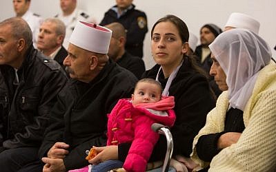 Rinel Saif, (C), wife of Israeli Druze police officer Zidan Saif, seen during a ceremony in his honor in the Jewish orthodox neighborhood of Har Nof, Jerusalem, November 27, 2014 (photo credit: Yonatan Sindel/Flash90)