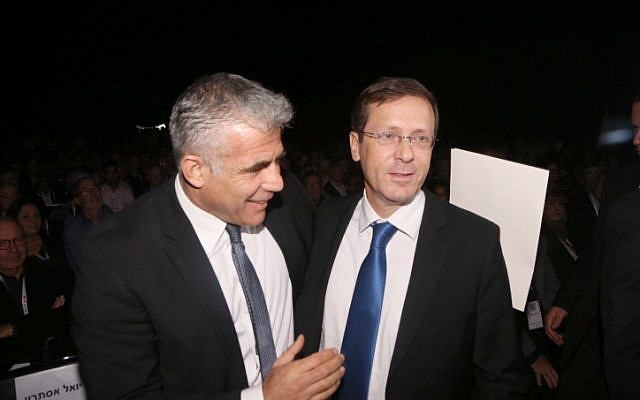 Yesh Atid party leader Yair Lapid (L) and Zionist Union party leader Isaac Herzog on December 24, 2014. (photo credit: Flash90) Yesh Atid party leader Yair Lapid (L) and Zionist Union party leader Isaac Herzog on December 24, 2014. (photo credit: Flash90)