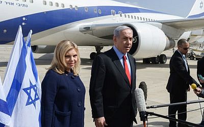 Prime Minister Benjamin Netanyahu and his wife, Sara Netanyahu, seen at Ben Gurion Airport, Tel Aviv, as they depart for the United States on Sunday, March 1, 2015, ahead of Netanyahu speech this week at the US Congress. (Photo credit: Amos Ben Gershom / GPO)